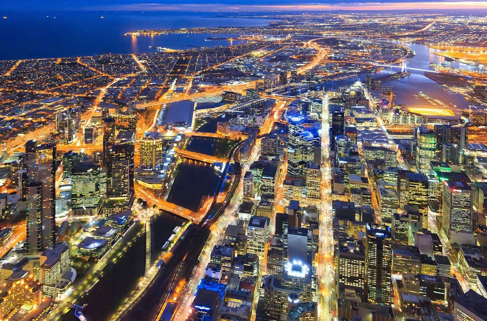 Aerial view Melb CBD, Southbank, Port Melbourne, Port Phillip Bay and beyond.