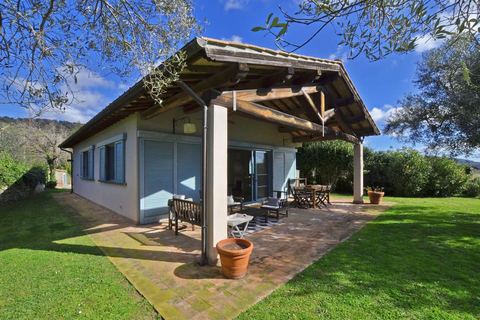 The tipical Chalet whit the garden and the sourrounding lawn