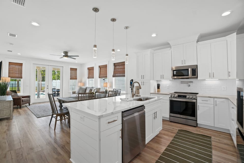 Your modern open-concept kitchen flows seamlessly into the living area, creating the perfect space for cooking and entertaining together.