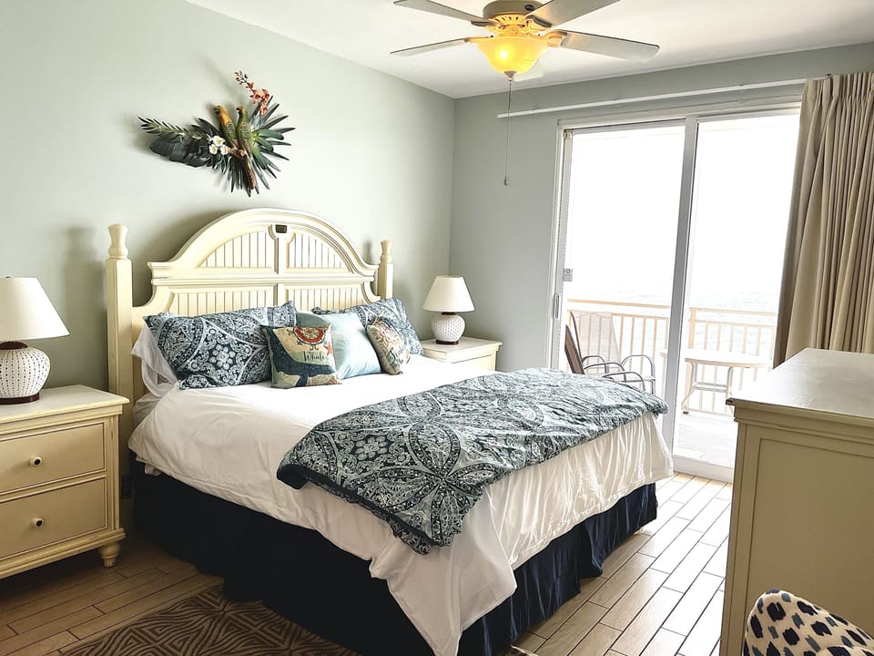 Master Bedroom with Beachfront Views and Main Balcony Access