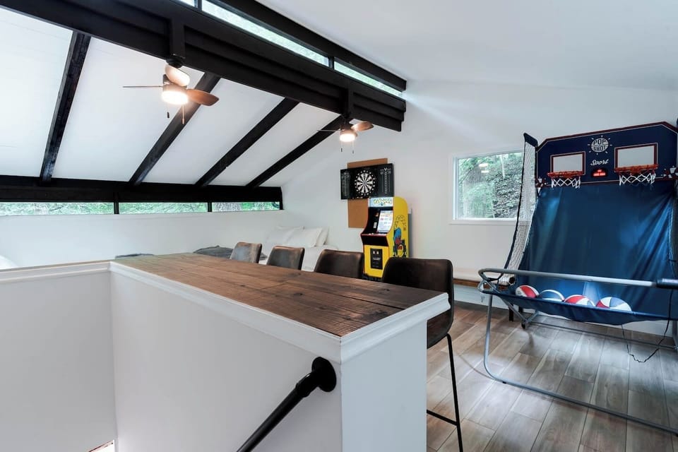 Game Room | 4th BR w/ Luxury Queen Beds | Fooseball | PacMan | Darts | Seated Bar | 65" Smart TV | Located in 3rd Floor Loft