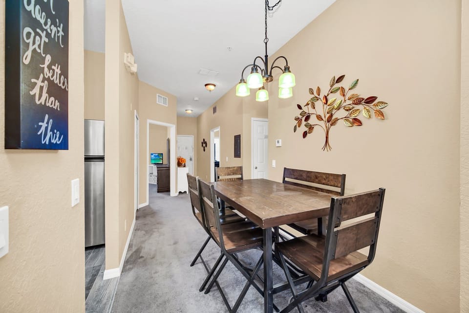 Dining nook comfortably seats six, with views overlooking the tranquil outdoor setting.