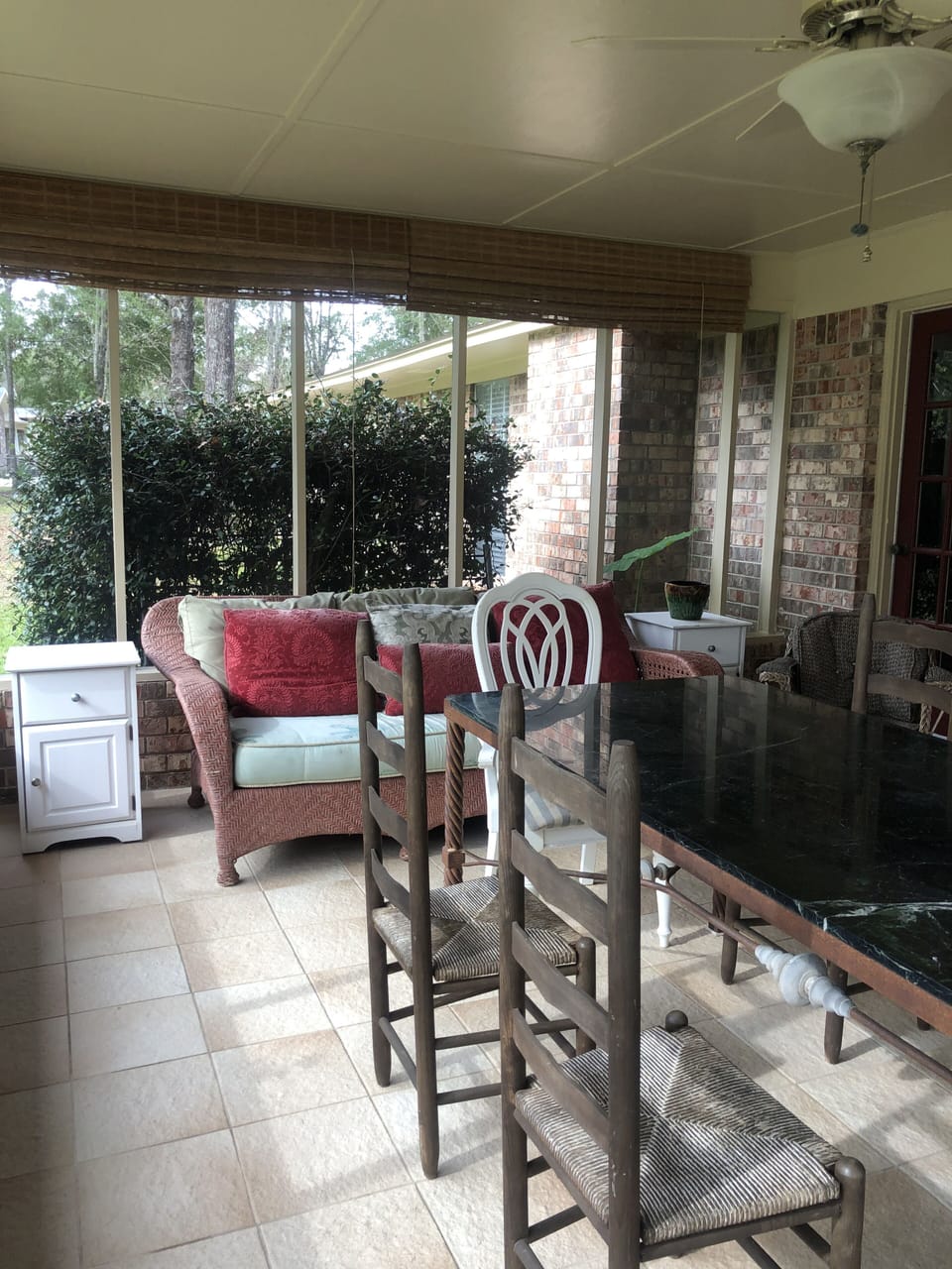 Screened back porch - enjoy the breeze and view