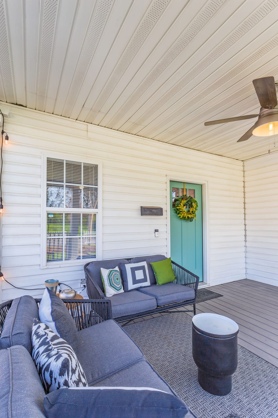Large, relaxing front porch with ambiance lighting