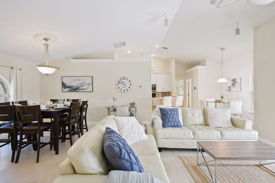 Understated art pieces adorn the walls, adding style to the space while still keeping that modern, uncluttered aesthetic.