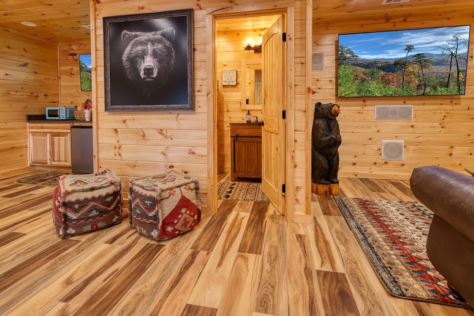 First floor bathroom between pool table and media room