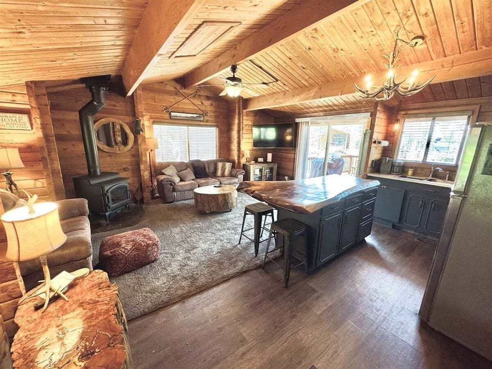 Living area with wood burning stove, Sat/Smart TV,