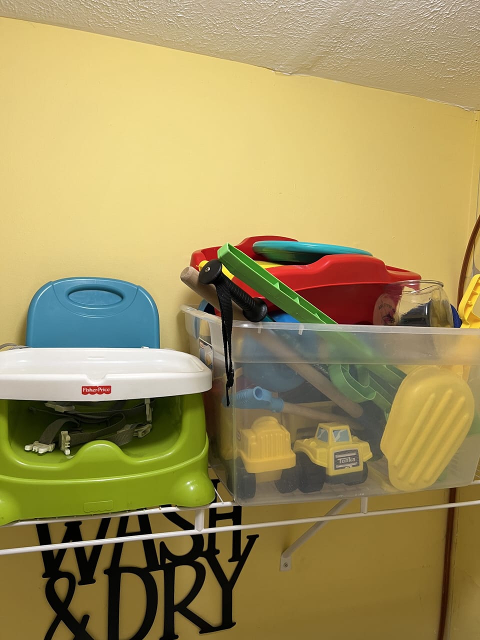Portable high chair and beach toys for your use