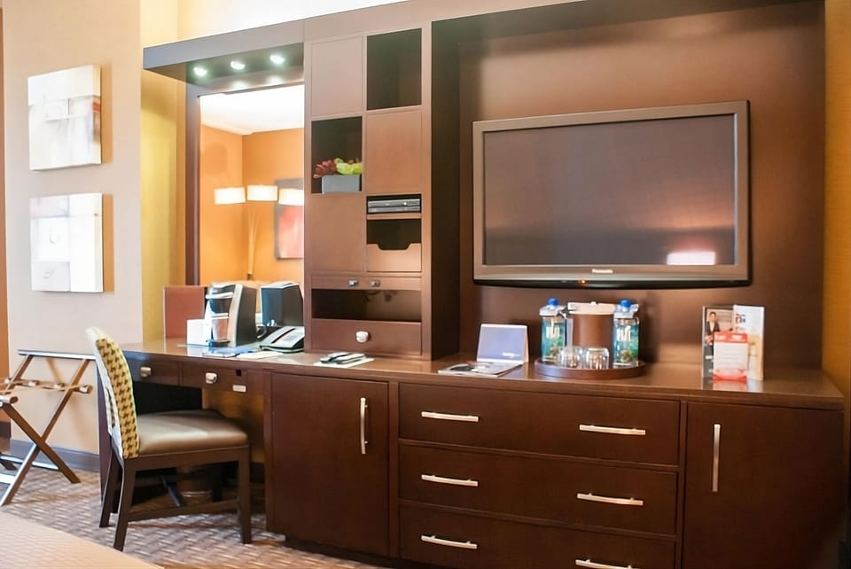 Kick back with a large TV and organized storage.