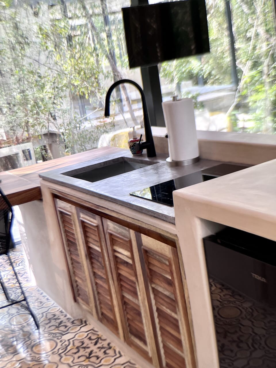 Kitchen with 2 burner stove and fridge for making meals 