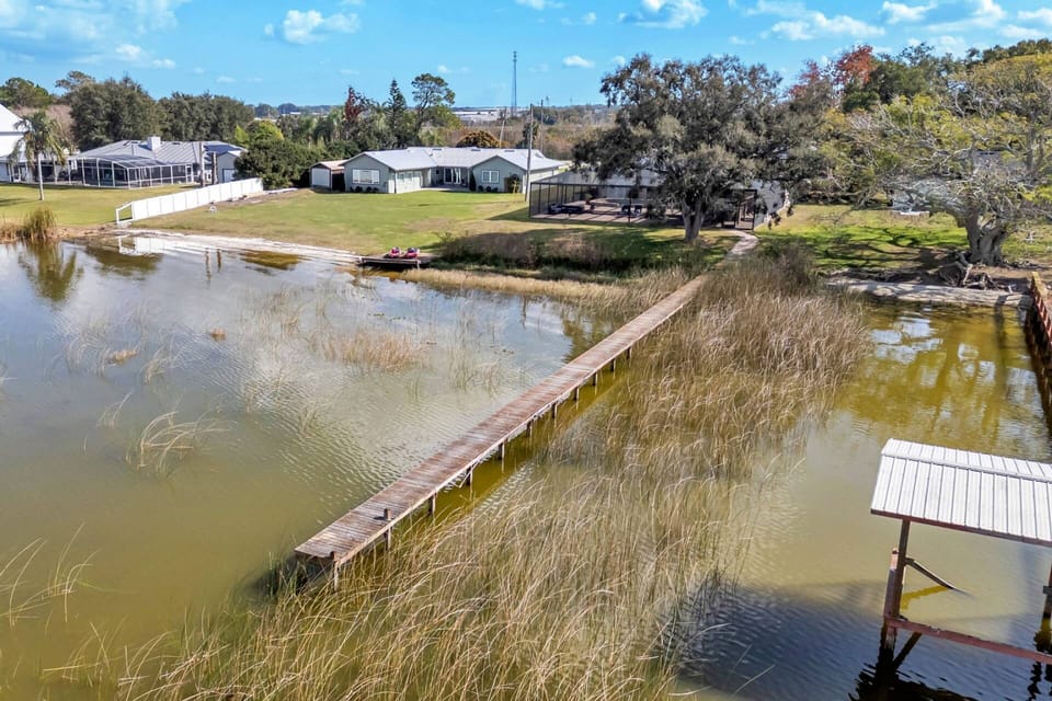 Private dock and serene shoreline offer the ultimate lakefront experience for fishing, kayaking, or enjoying the view.