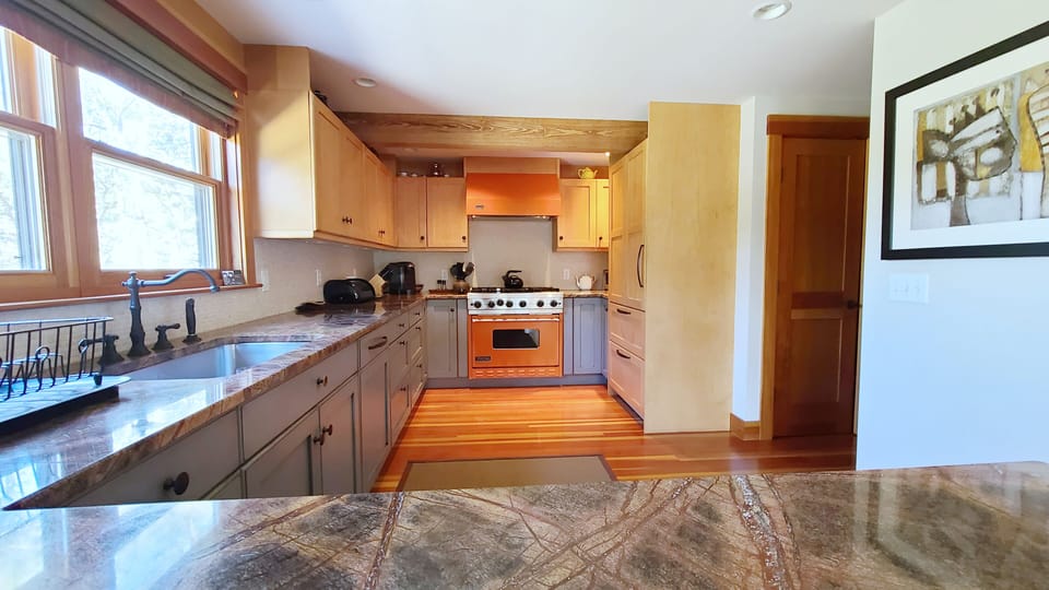 High end kitchen with granite counter tops