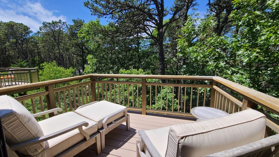 Wooded views from balcony off master bedroom