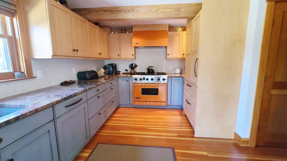 High end kitchen with Viking range and stainless appliances