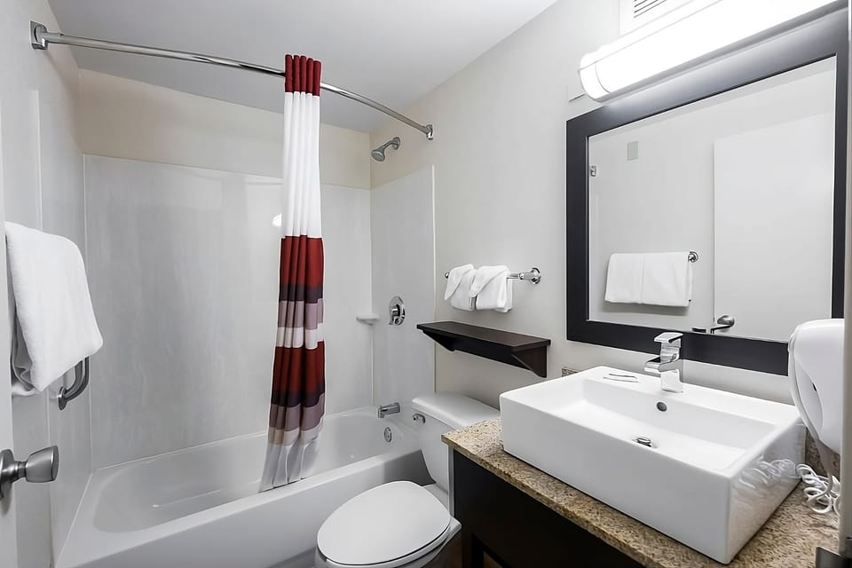 Refresh easily with bright vanity space and tub-shower.