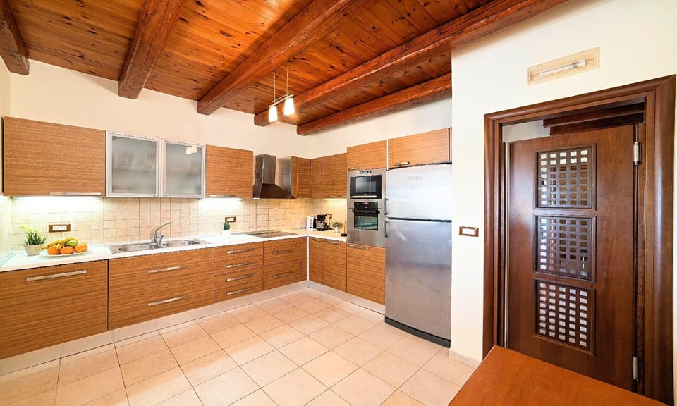 Kitchen area. Villa Stelios | HotelPraxis Group