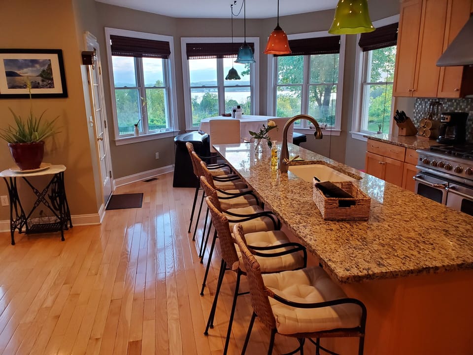 Seating for 6 at island and seating for 6 at window bar height table 