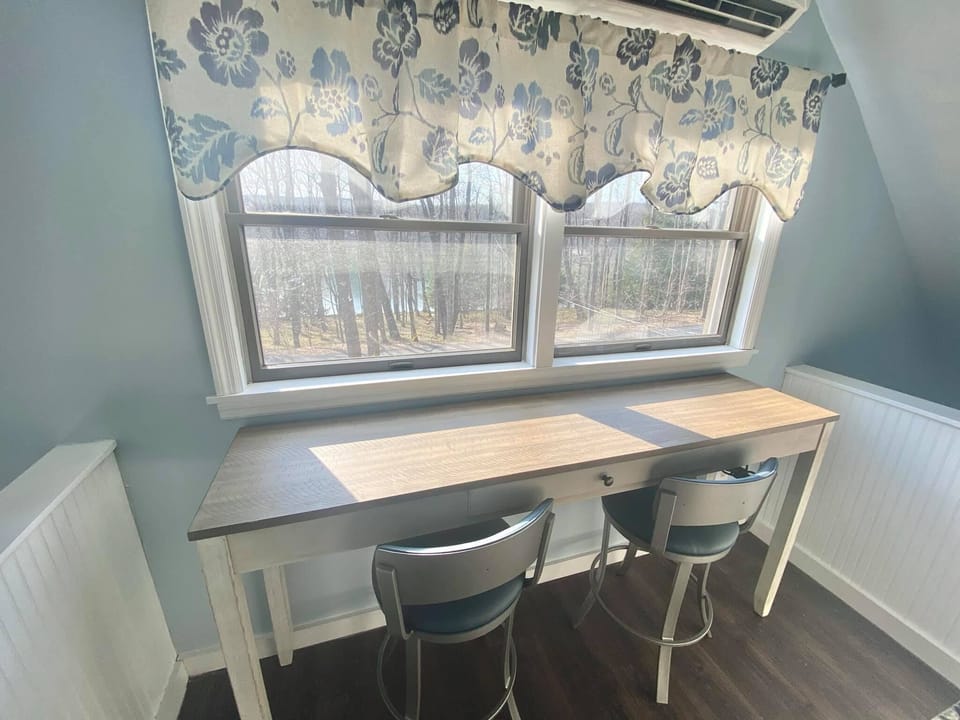 Workstation with a lake view — perfect for peaceful productivity.