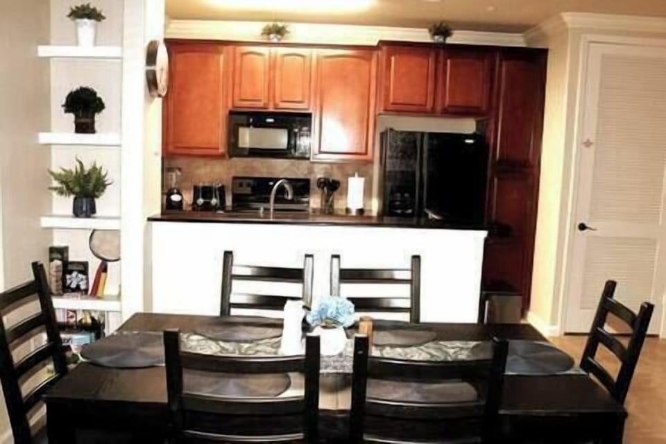 Dining room with seating for 6 and kitchen