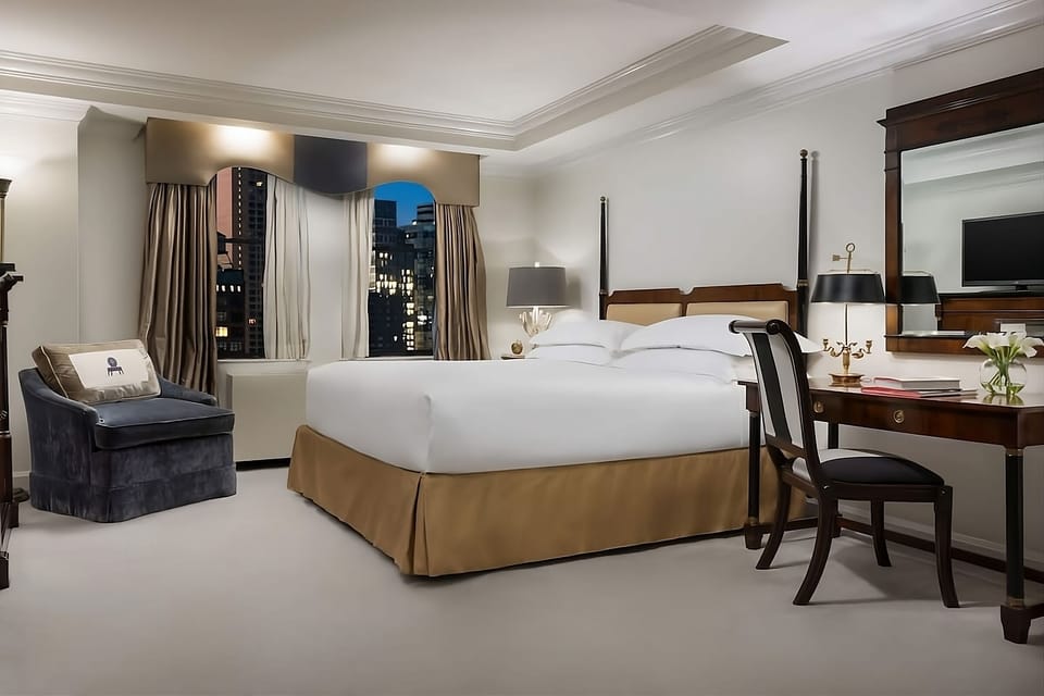 Unwind by the window with sparkling city lights.