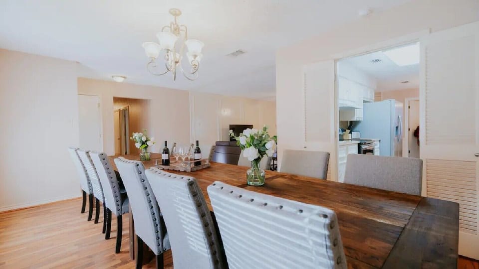 Massive dining room table seats 12 for the entire family to gather 