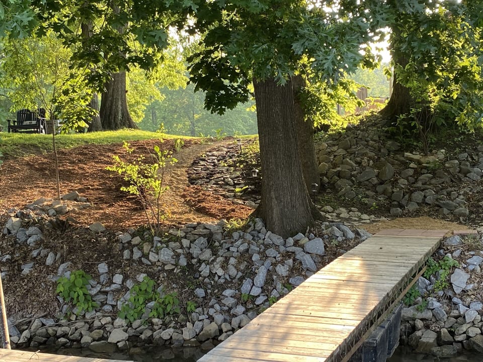 Side view leading to our rocker bench-we love to sit here and watch the boats 