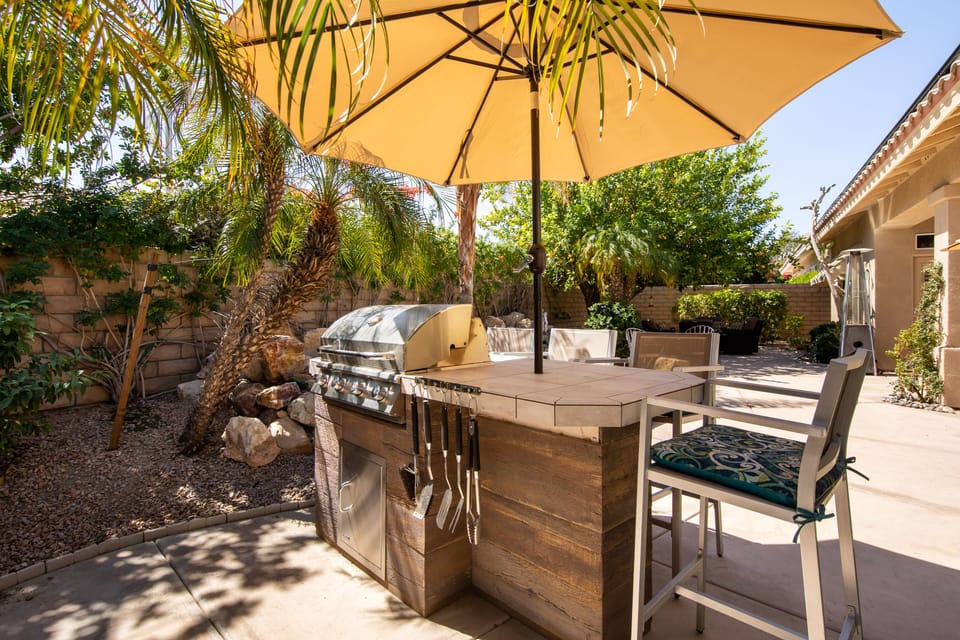 Outdoor living with BBQ/ bar style seating. 