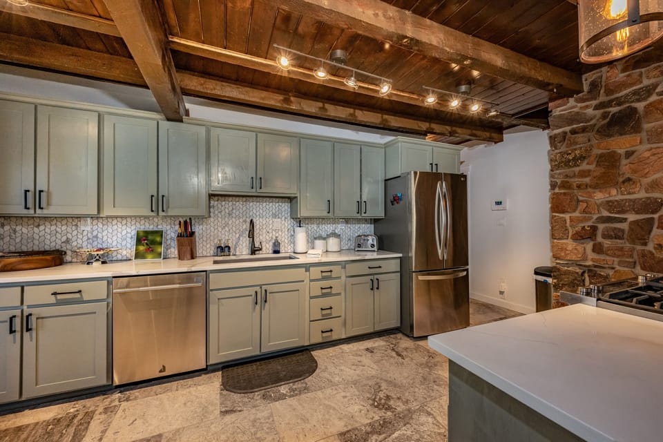 Ample counter space for family meals.  New Jennair dishwasher with kitchen pack