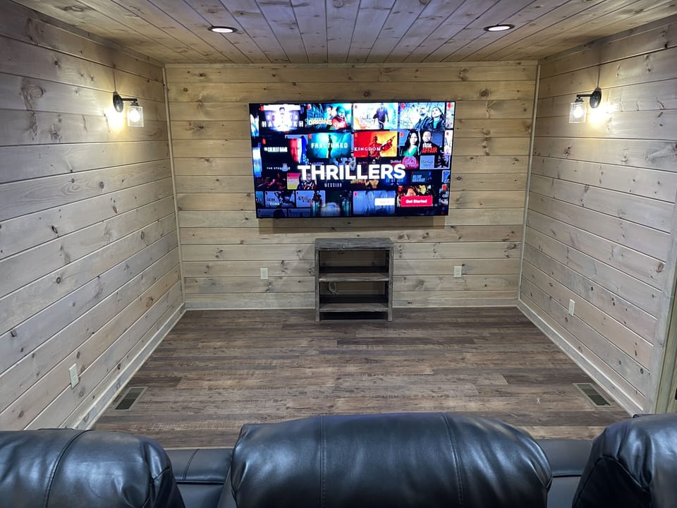 Private theater room with 85” TV