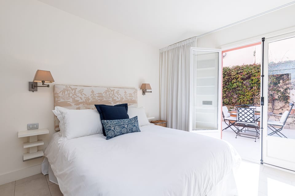 The master bedroom showing the access out to the private terrace. 