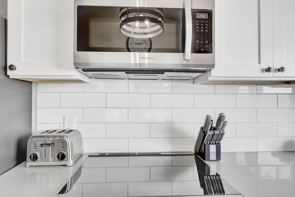 Blender, crock pot, baking sheets, mixing bowls, and baking dishes included. 