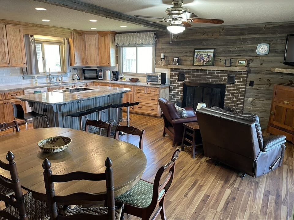 Dining table seats 7, bar seats 5, screen porch dining for 11 at tables.