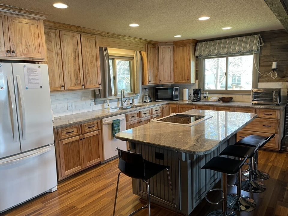 renovated kitchen with granite.