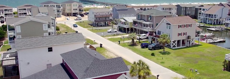 5 minute walk to beach and fishing pier. 