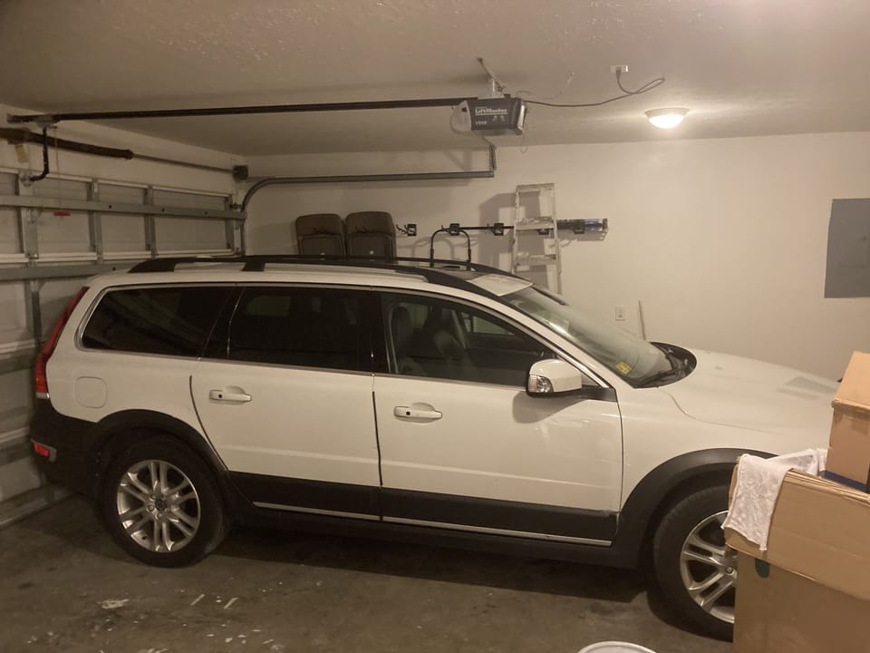 Large attached garage with remote opener. Car not included. 