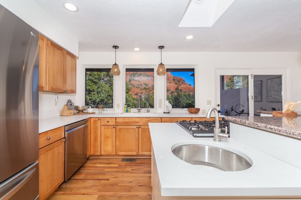 Featuring stunning granite countertops, a large kitchen island, and top-of-the-line appliances, it has everything you need to prepare meals effortlessly.