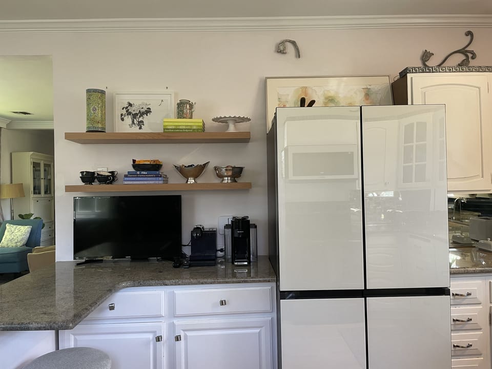 Kitchen, with Nespresso cappuccino and coffee makers.
