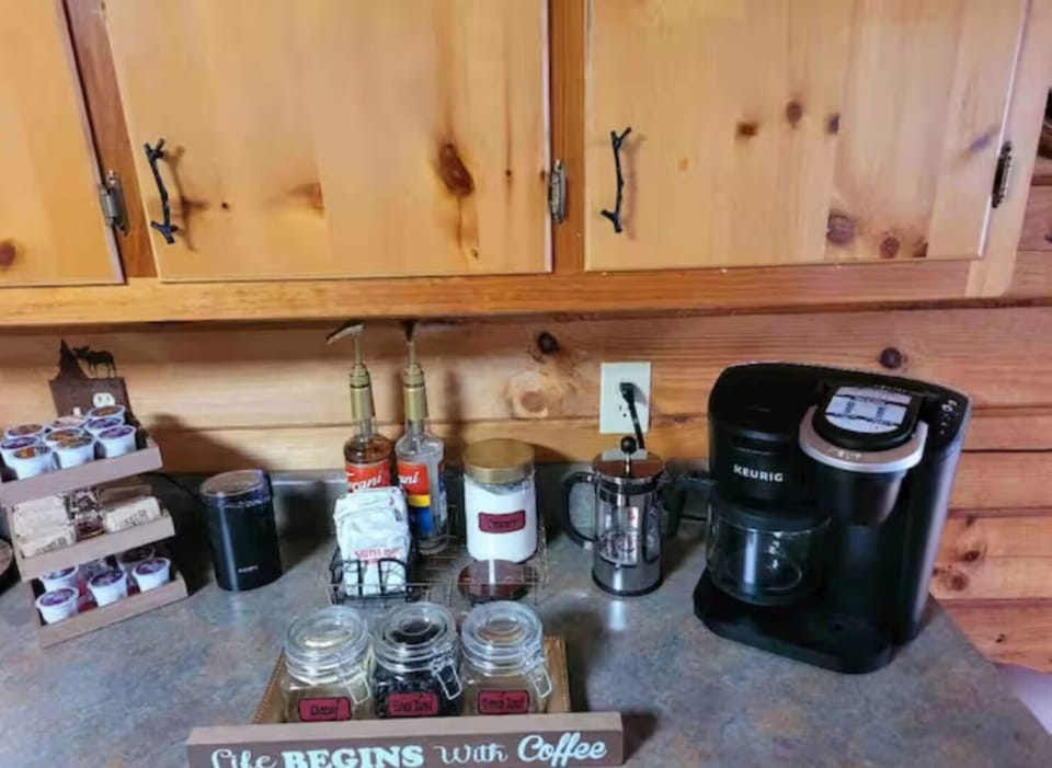 Visit our well stocked Coffee Bar! We have a DUO-KEURIG, French Press & Grinder 