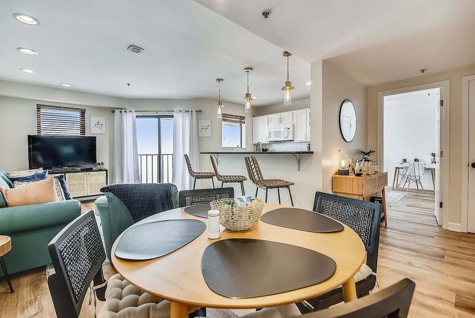 Relax in an open space that keeps meals and downtime connected.