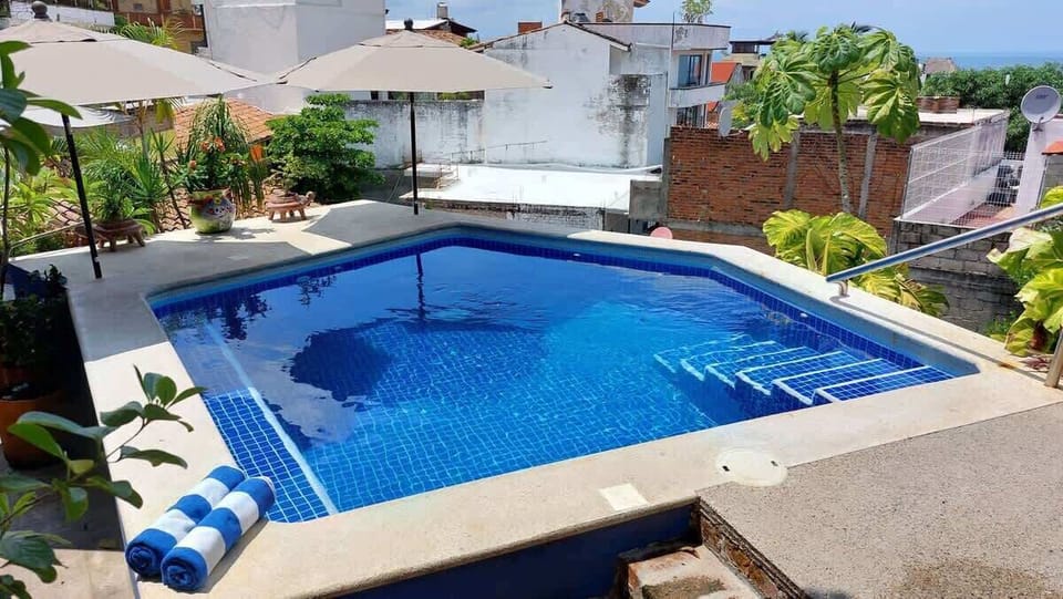 View of the pool from the Upper Shared Terrace. 