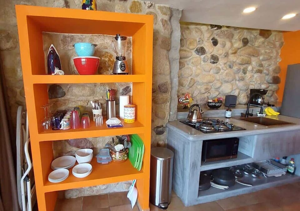 Glassware, plates, and other cooking items are within easy reach. We also include fresh coffee from Chiapas and whole milk, sugar, stevia, and a variety of teas. Our staff refills as needed.