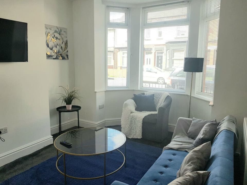 Living room with sofa bed and bathroom