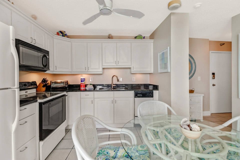 The full kitchen comes equipped with oven, microwave, dishwasher and refridgerator/freezer.