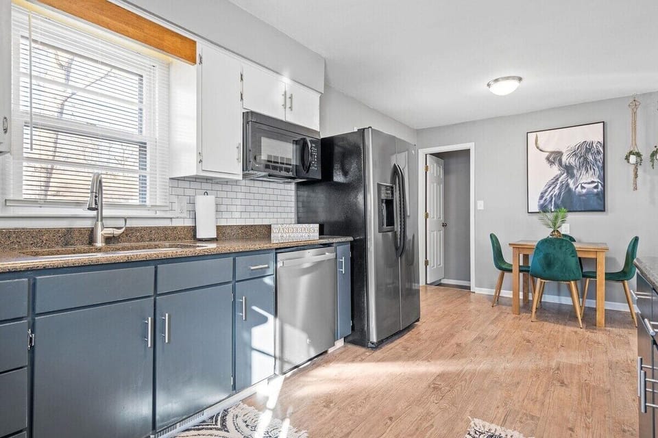 Bright, Functional Kitchen with Ample Counter Space, Coffee Bar & All Essentials for Longer Stays.