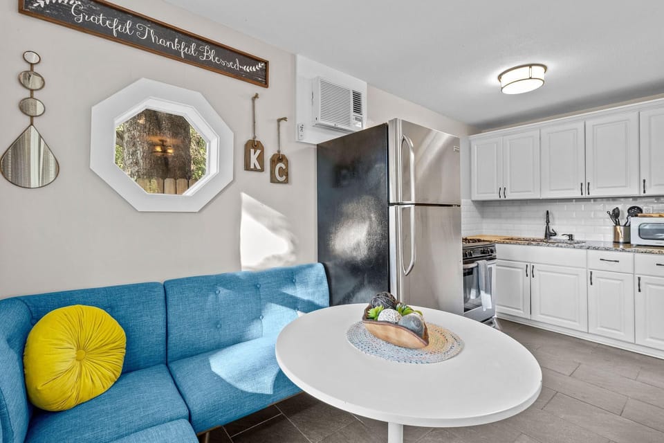 Bright kitchen with a cozy breakfast nook and plenty of space to enjoy meals before heading to Midtown or the Plaza