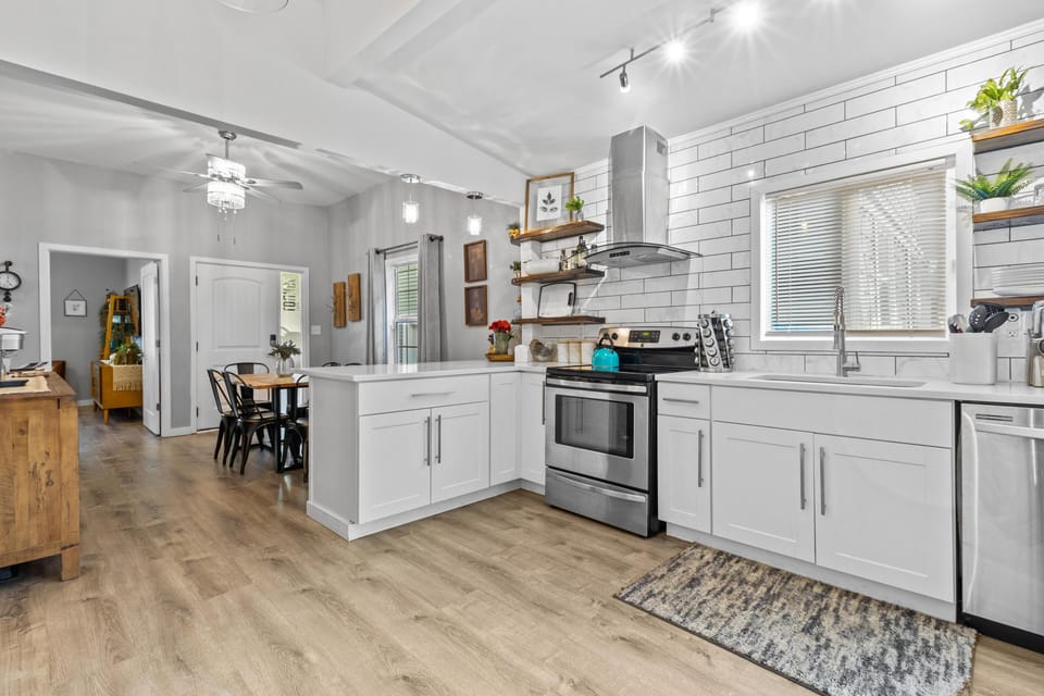 A cozy, thoughtfully designed kitchen with everything you need for home-cooked meals before exploring the Country Club Plaza, just 1 mile away.