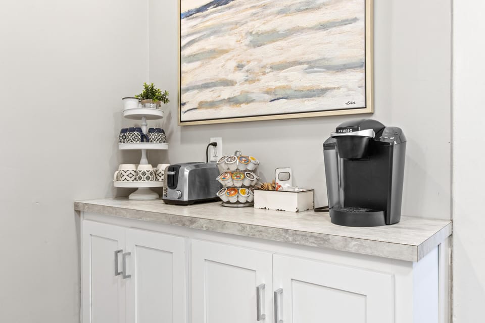 Enhanced coffee bar provided with 3 different brewing options (coffee, creamer and sugar provided)