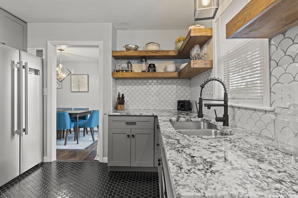 Bright, functional layout connecting seamlessly to the dining room — ideal for extended guests who value space and comfort during long-term stays.