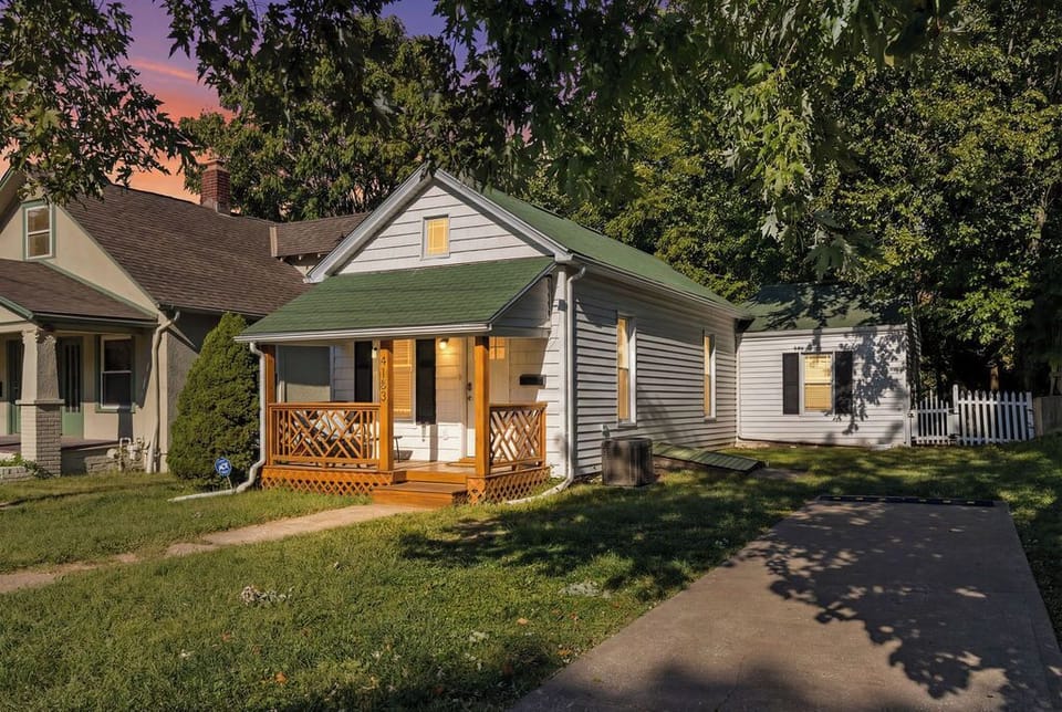 Charming Westport Hideaway with a welcoming front porch and driveway parking—pet-friendly and perfectly located within walking distance to Westport hotspots and the KC Streetcar.
