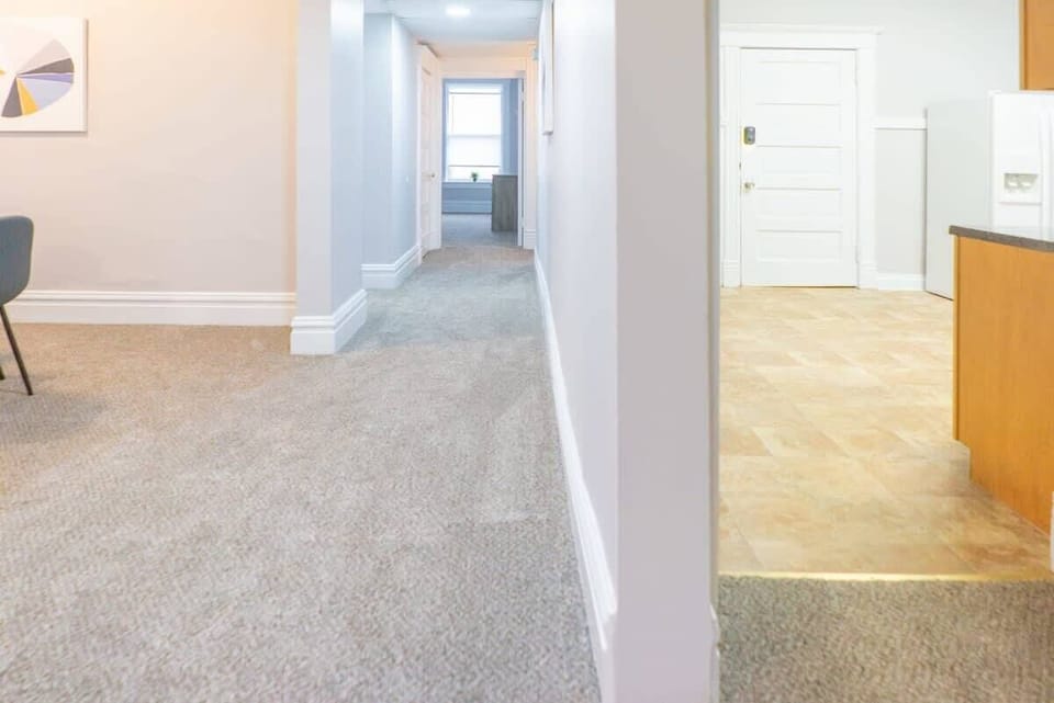 The kitchen is across the hallway